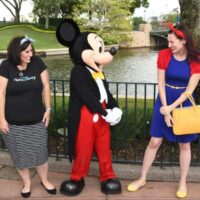 two women meeting Mickey Mouse in Epcot