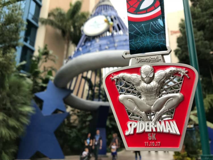 spider-man medal. runDisney Disneyland vs Walt Disney World