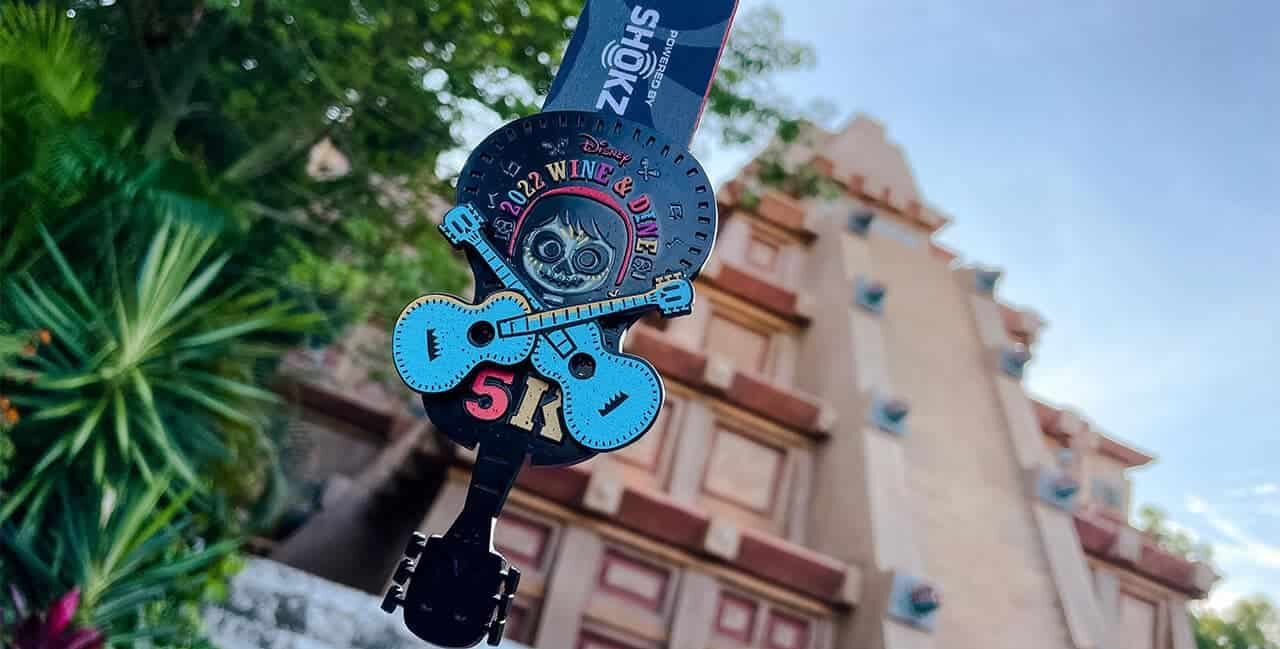start the perfect runDisney season with the Wine and Dine race weekend. This is the wine and dine 2022 5K medal. Coco themed medal in front of Mexico pavillion at Epot.