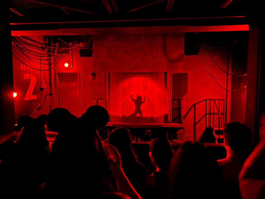 is mission breakout too scary? Rocket silhouette with red lighting on the ride. 